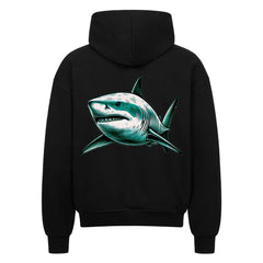 Der Oversized Zipper Hoodie "Hai" von MarketPrint ist ein schwarzer Premium-Kapuzenpulli im Oversized-Schnitt mit einer auffälligen Hai-Grafik in Grün und Weiß auf dem Rücken. Hergestellt aus 100% Baumwolle für Komfort und Stil.