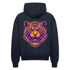 Der schwarze Oversized Zipper Hoodie "Bär" von MarketPrint zeigt eine große, detailreiche Tigerkopf-Grafik in Orange und Lila mit offenem Maul auf dem Rücken. Hergestellt aus 100% Baumwolle für erstklassigen Komfort.