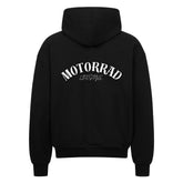 Der MarketPrint Oversized Zipper Hoodie "Motorrad Lifestyle" besticht durch einen fetten, weißen Bogenschriftzug auf dem Rücken und einen übergroßen Schnitt. Hergestellt aus 100% Baumwolle, bietet er Komfort und Stil.