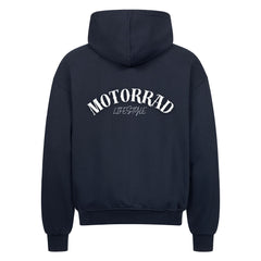 Der MarketPrint Oversized Zipper Hoodie "Motorrad Lifestyle" in navyblau, von hinten gesehen, zeigt "MOTORRAD LIFESTYLE" in geschwungenen weißen Blockbuchstaben auf dem oberen Rücken.