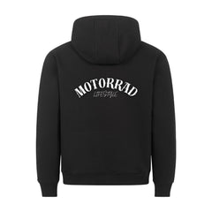 Der MarketPrint Premium Hoodie "Motorrad Lifestyle" in schwarz hat eine lockere Passform und einen auffälligen, gewölbten weißen "MOTORRAD LIFESTYLE"-Text auf dem oberen Rücken. Abgebildet von hinten. Hergestellt in Türkiye.