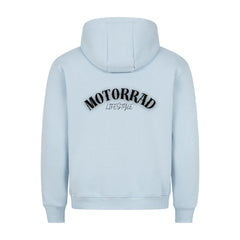 Der MarketPrint Premium Hoodie "Motorrad Lifestyle" in Hellblau hat eine bequeme Passform und einen auffälligen schwarz-weißen MOTORRAD LIFESTYLE Schriftzug auf dem oberen Rücken, von hinten gesehen.
