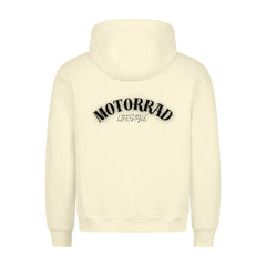 Der MarketPrint Premium Hoodie "Motorrad Lifestyle" zeigt sich von hinten in creme, mit fettem schwarzen MOTORRAD LIFESTYLE Schriftzug quer über den oberen Rücken, mit einem gemütlichen Schnitt und sorgfältiger Verarbeitung, Made in Türkiye.