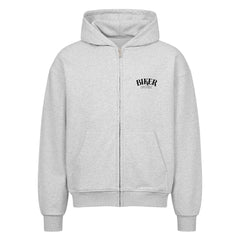 Der MarketPrint Oversized Zipper Hoodie "Totenkopf Helm" ist grau mit schwarzem Text, hergestellt aus 100% Baumwolle für Komfort und Stil.