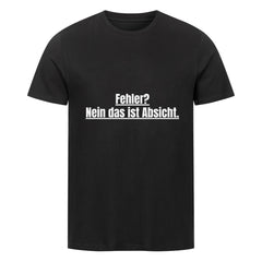 Das MarketPrint Premium Shirt "Fehler?" ist ein schwarzes Unisex-T-Shirt aus weicher Single-Jersey-Biobaumwolle mit dem weißen Text "Fehler? Nein das ist Absicht." mittig auf der Vorderseite, vor weißem Hintergrund.