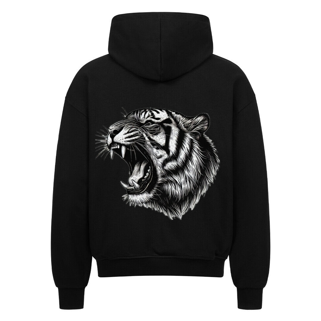 Der Oversized Zipper Hoodie "Tiger" von MarketPrint ist ein schwarzer Premium-Kapuzenpulli mit einem auffälligen Tigergesicht, gefertigt aus 100% Baumwolle und in einer übergroßen Passform für Komfort und Stil.