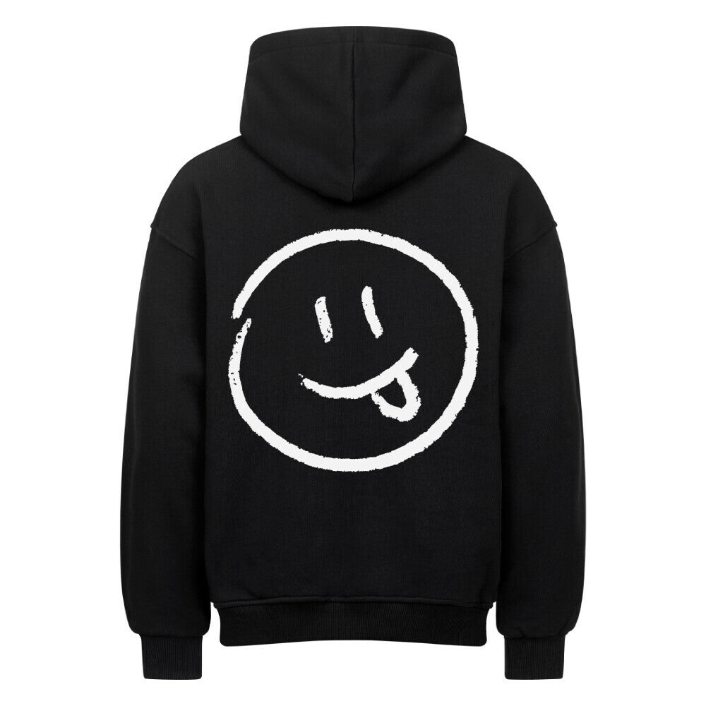 Der MarketPrint Oversized Hoodie "Smiley" ist ein schwarzer Premium-Kapuzenpulli mit einem großen weißen Smiley-Gesicht - verspielte Augen und herausgestreckte Zunge - auf dem Rücken sowie einer gemütlichen Kapuze und gerippten Bündchen für zusätzlichen Komfort.