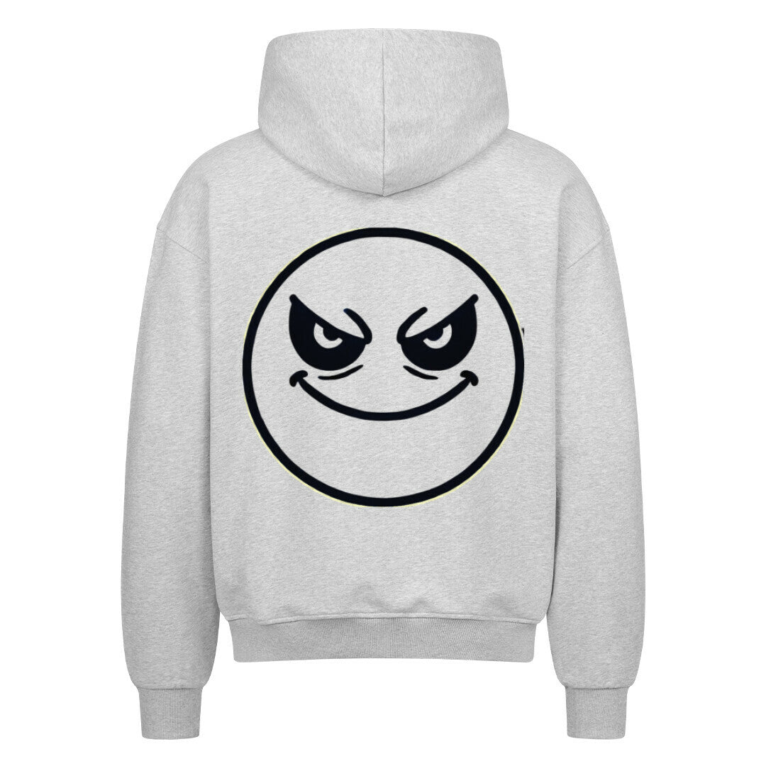 Der MarketPrint Oversized Zipper Hoodie "Böser-smiley" ist hellgrau, besteht aus 100% Baumwolle und ist auf der Rückseite mit einer schwarzen Kontur eines grinsenden Gesichts mit gewölbten Augenbrauen bedruckt.