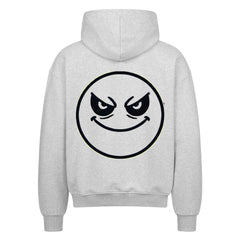 Der MarketPrint Oversized Zipper Hoodie "Böser-smiley" ist hellgrau, besteht aus 100% Baumwolle und ist auf der Rückseite mit einer schwarzen Kontur eines grinsenden Gesichts mit gewölbten Augenbrauen bedruckt.