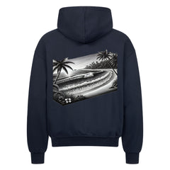 Der Oversized Zipper Hoodie "Strand" von Infinity Merch in navy ist von hinten abgebildet und zeigt eine schwarz-weiße tropische Strandgrafik mit Palmen, Wellen und einem Surfer. Hergestellt aus 100% Baumwolle für Komfort.