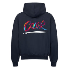 Der MarketPrint Oversized Zipper Hoodie "COLOR" in navy hat einen mehrfarbigen "Color"-Print mit Pinselstrichen und einen weißen Swoosh auf dem Rücken, eine übergroße Passform und ist aus 100% Baumwolle für ultimativen Komfort.