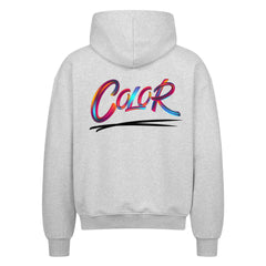 Der MarketPrint Oversized Zipper Hoodie "COLOR" in Hellgrau besticht durch seinen fetten, farbigen Verlaufsschriftzug "COLOR" über einem schwarzen Swoosh auf dem Rücken. Der Premium-Kapuzenpulli aus 100% Baumwolle hat einen übergroßen Schnitt und ist flach liegend mit dem Rücken nach oben abgebildet.