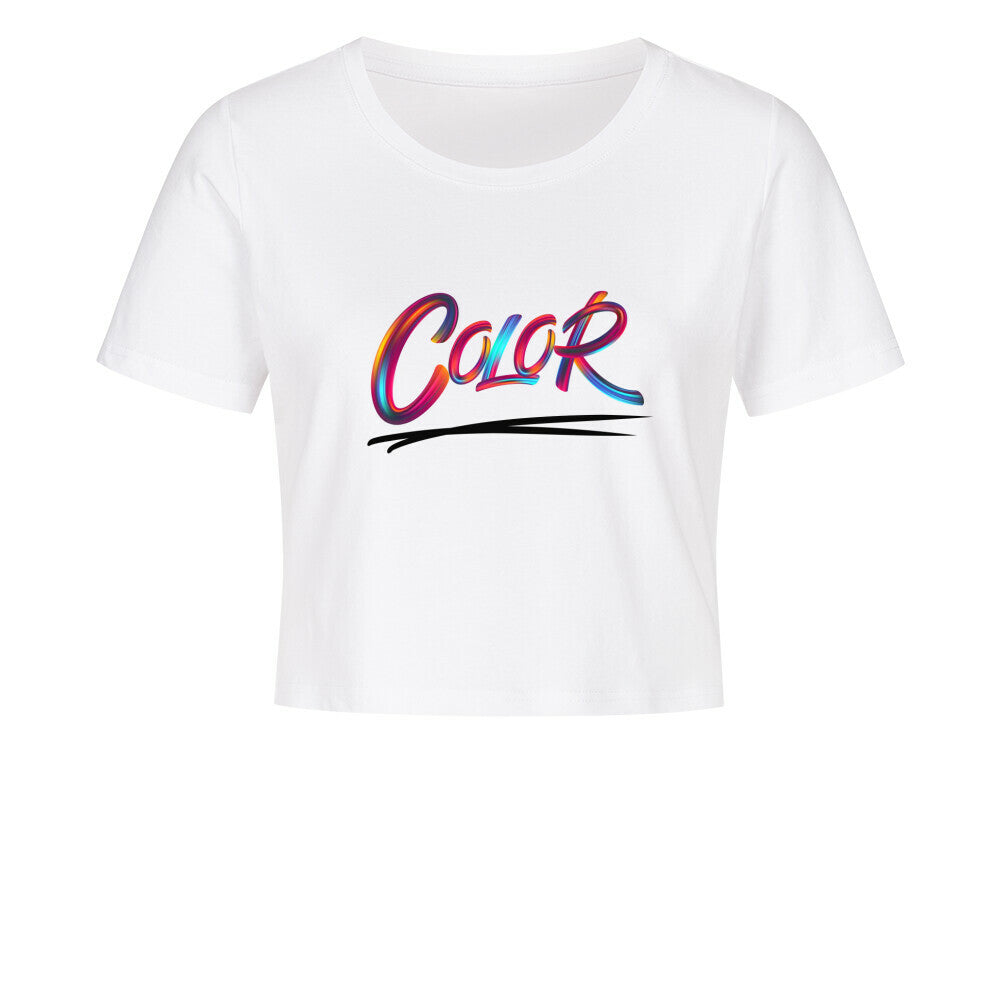 Das Ladies Cropped "COLOR" Shirt von MarketPrint ist ein kurz geschnittenes weißes Damen-Shirt aus Baumwolle mit dem bunten, geschwungenen "Color"-Schriftzug und schwarzer Wellen-Unterstreichung auf der Vorderseite.