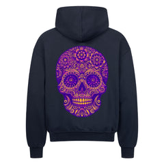 Der MarketPrint Oversized Zipper Hoodie "Totenkopf" ist ein schwarzer Premium-Kapuzenpulli im Oversized-Schnitt, der einen auffälligen lila-orangenen Totenkopf mit Blumen- und Wirbel-Details auf dem Rücken zeigt.
