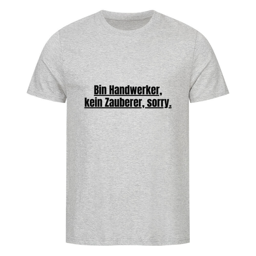 Das MarketPrint Premium Shirt "Zauberer" ist ein hellgraues unisex Kurzarm Singlejersey T-Shirt mit schwarzem Text: Bin Handwerker, kein Zauberer, sorry. Dargestellt auf einem schlichten weißen Hintergrund.