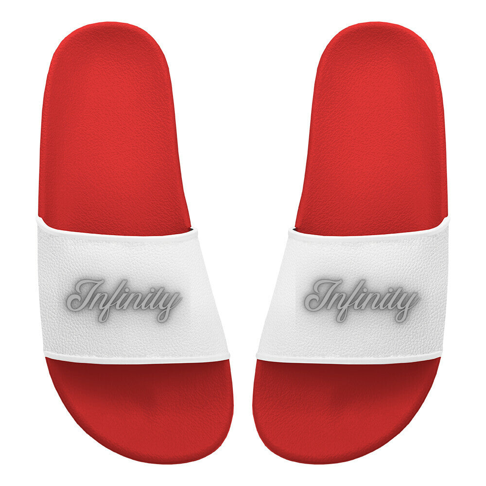 Die MarketPrint Badelatschen "Infinity" sind rote PVC-Sandalen mit weißen Riemen, die das Wort "Infinity" in grauer Schrift zeigen. Abgebildet von oben auf einem schlichten weißen Hintergrund, sind sie perfekt für Ihren nächsten Badetag.
