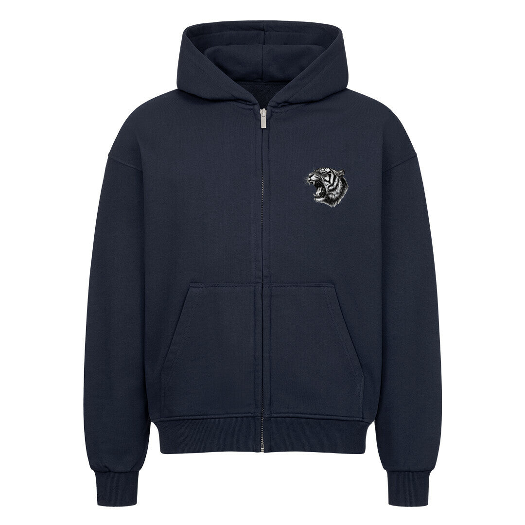 Der Oversized Zipper Hoodie "Tiger" von MarketPrint ist marineblau, aus 100% Baumwolle mit einer Fronttasche, übergroßem Schnitt und einem kleinen gestickten brüllenden Tigerkopf auf der linken Brust.