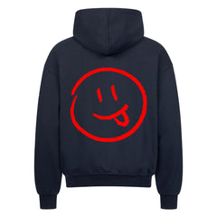 Der MarketPrint Oversized Zipper Hoodie "Smiley" ist eine schwarze Herren Kapuzenjacke mit einer auffälligen roten Smiley-Grafik auf dem Rücken - mit Strichaugen und herausgestreckter Zunge - für auffälligen, lässigen Style und Komfort.