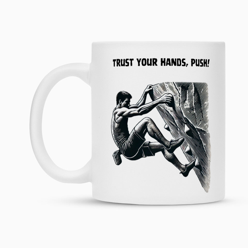 Die MarketPrint Tasse "Bouldern" ist eine weiße Keramiktasse mit einer schwarz-weißen Kletterer-Illustration und dem Text "TRUST YOUR HANDS, PUSH!". Die Duraglaze-Beschichtung sorgt für lebendige Details und dauerhafte Qualität.