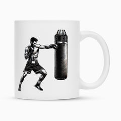 Die Tasse "Boxer" von MarketPrint ist eine weiße Keramiktasse mit schwarz-weißer Boxer-Illustration und strapazierfähiger Duraglaze-Beschichtung für brillante, langanhaltende Farben.