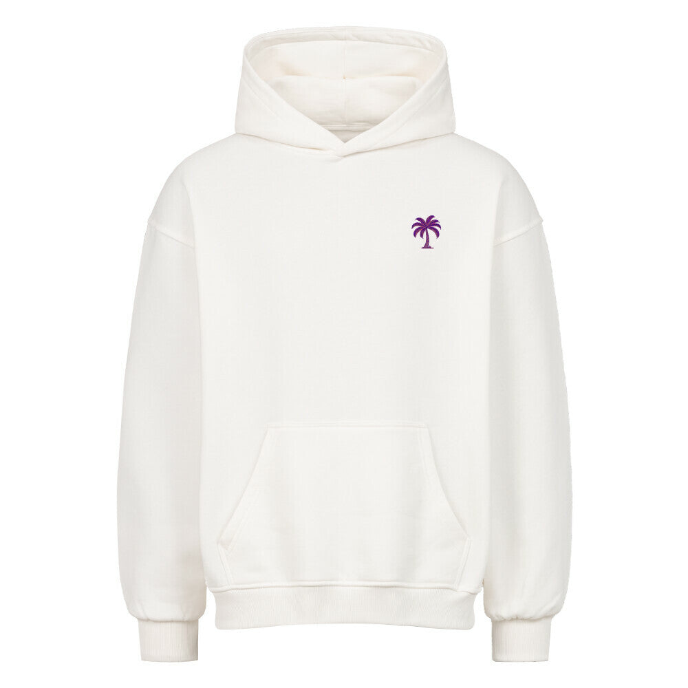 Der Infinity Merch Oversized Hoodie "Strand" ist ein schlichter weißer Hoodie mit einer Fronttasche und einer kleinen lila Palmengrafik auf der linken Brust.