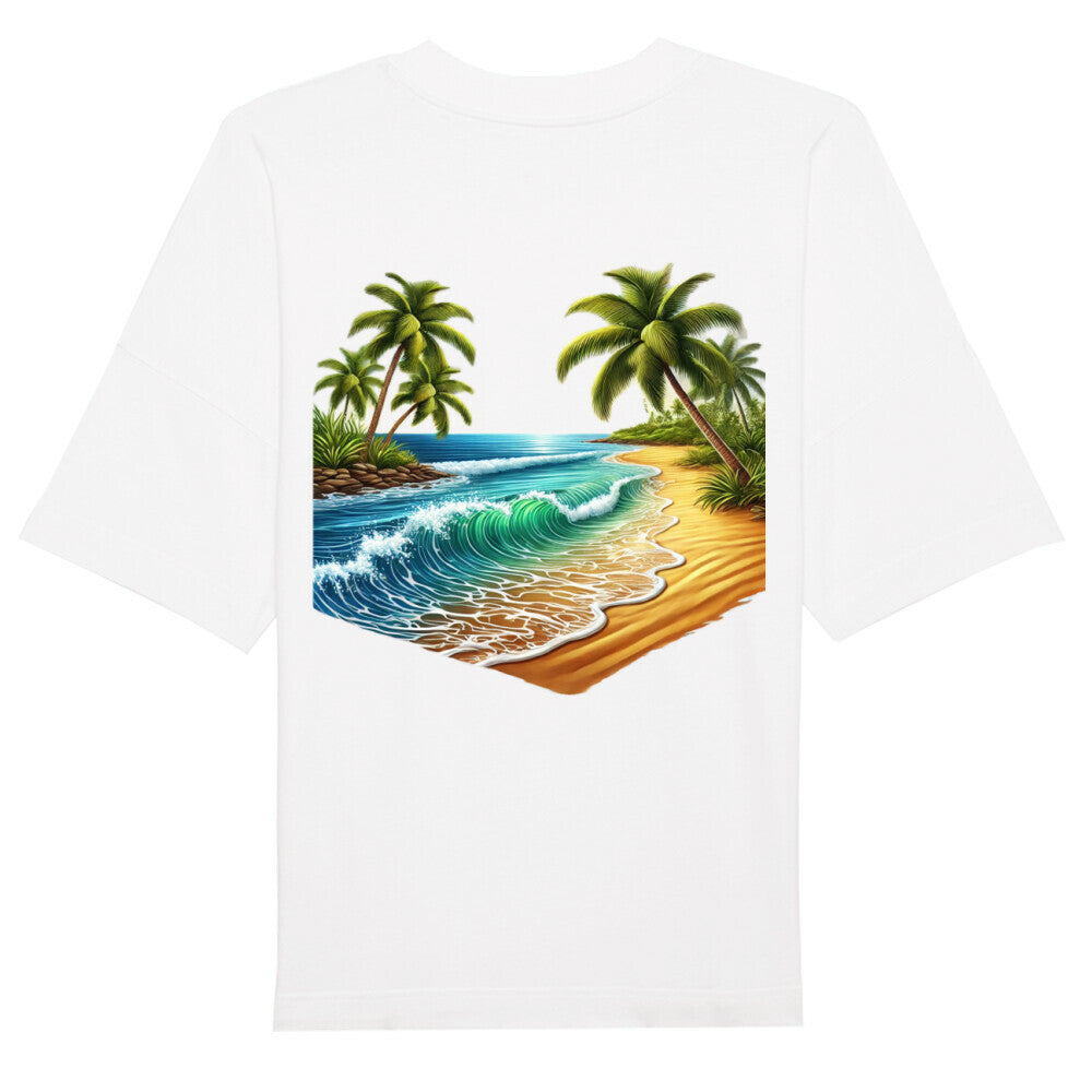 Das Infinity Merch Premium Oversize Blast "strand" T-Shirt aus Bio-Baumwolle überzeugt mit farbenfrohem Backprint: tropische Palmen, grüne Pflanzen und Wellen - perfekt für entspannte Sommertage.